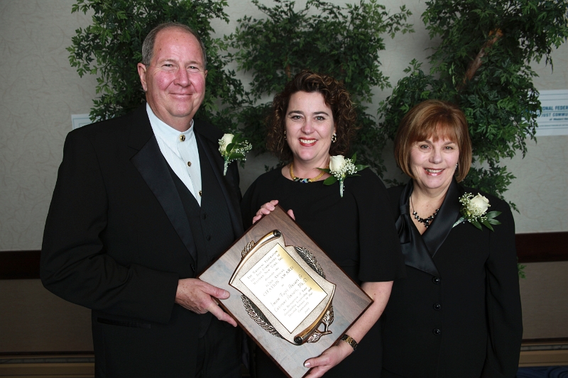 Award Recipient 1 with family.jpg